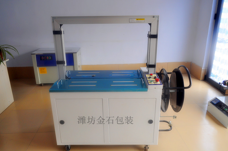 B-201A全自動桌(zhuō)面滾筒傳動(dong)型打包機捆(kǔn)紮機