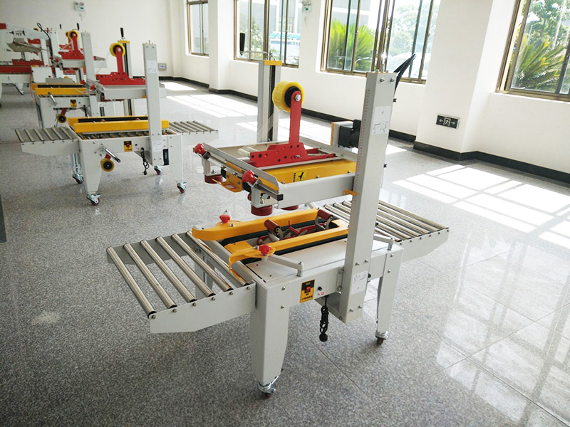 JS-FX500C 上下驅動(dòng)手動折蓋膠帶封(feng)箱機